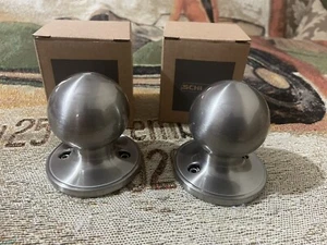 2 SCHLAGE Non-turning Satin Nickel Dummy Corona Door Knobs J170 CNA 619 NEW - Picture 1 of 7