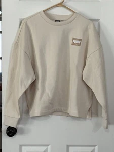 Nuevo con etiquetas Pullover PUMA de Vellón Cuello Redondo para Damas, Color Tostado, Talla L - Imagen 1 de 10