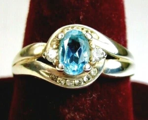 Beautiful 925 St. Silver Ring, with 6x4 mm Oval Blue Topaz & CZX, Size P 1/2 - Picture 1 of 4