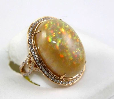 Anillo solitario natural enorme ovalado con halo de diamantes y ópalo de fuego de oro rosa de 14 k de 20,97 quilates Foto 1 de 4
