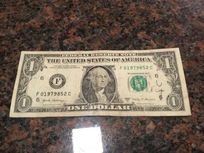 2017A $1 ONE DOLLAR BILL ERROR  INK WELL CONTAMINATION ERROR   BLACK SERIAL - Image 1 of 4