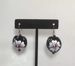 Earrings, painted acrylic heart dangles, black with white flowers, red accents - Picture 1 of 5
