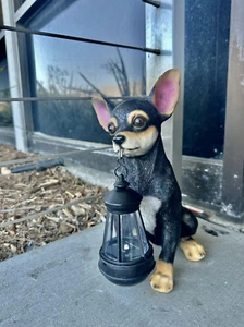 Garden sculpture, outdoor, miniature pinscher holding a lantern, autumn, artwork - Picture 1 of 1