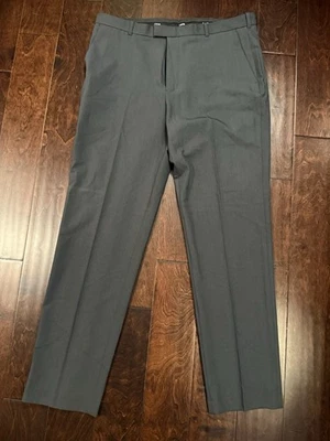 Pantalones de vestir para hombre Izod, calce recto, frente plano, sin planchar, carbón, talla 38x34 Foto 1 de 4