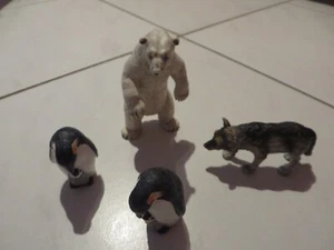 Schleich Kunststofftiere Spieltiere Unbespielt Eisbär stehend Wolf Pinguine - Bild 1 von 1