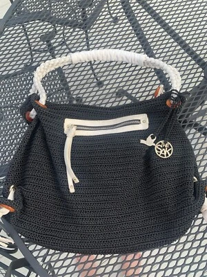 Bolso de Mano The Sak Edición Limitada Tejido Paz Negro Con Acentos de Lona Naranja Foto 1 de 4