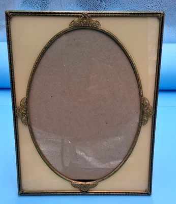 Vtg Gold Metal 8.5 x 11 Picture Frame  w/ Oval Gold Inset Velvet Hinged Stand - Image 1 of 4