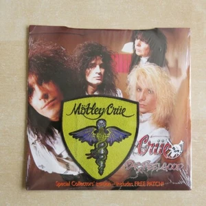 MOTLEY CRUE Dr Feelgood / Sticky Sweet UK 7" with patch Elektra 1989 Sealed - Bild 1 von 2