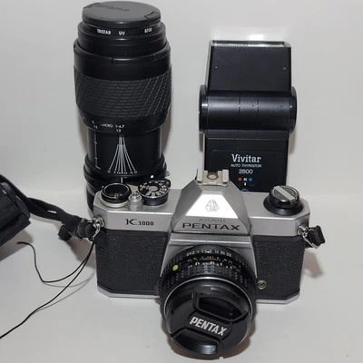 Asahi Pentax K1000 35mm Film Camera Bundle 50mm 70-210mm Zoom Lenses Cases - Image 1 of 4