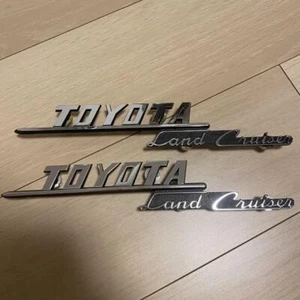 Toyota 200 Landcruiser für Nordamerika Frontgrill Emblem unbenutzt NEU - Bild 1 von 6