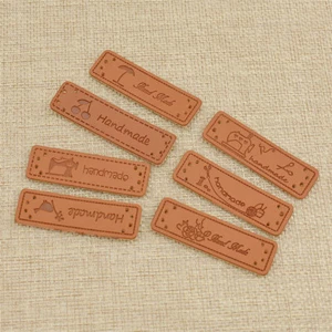 50 un. etiquetas de cuero PU para bolsas de ropa accesorios de decoración hechas a mano hágalo usted mismo - Imagen 1 de 10