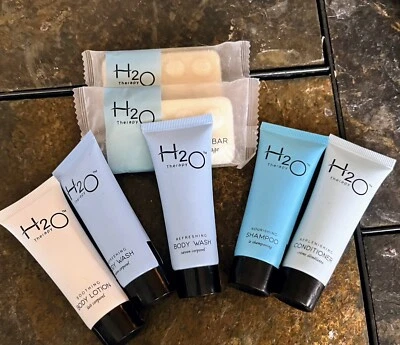7 Pc H2O THERAPY Travel Size Shampoo, Conditioner, Lotion, Body Wash Soap Bundle - Image 1 of 2