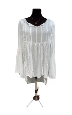 Blusa túnica August blanca seda talla L borla manga campana boho Foto 1 de 4