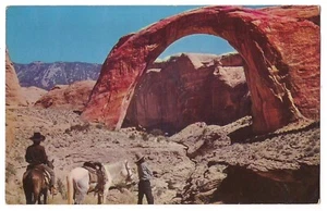 Couple on Horses Viewing The Natural Arch RAINBOW BRIDGE Utah Postcard UT - Picture 1 of 2