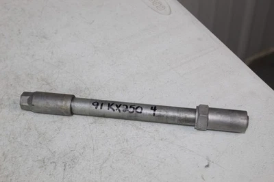 1990 - 1992 Kawasaki KX250 OEM передняя ось с гайкой KX 125 250 KX500 90-93 91/4 - Изображение 1 из 2