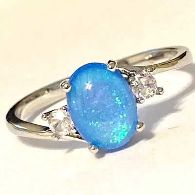 Anillo solitario de piedra de ópalo azul enchapado en plata corte ovalado simulado talla 7 8 9 11 Foto 1 de 4