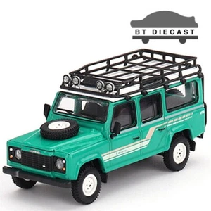 TSM MINI GT 1985 LAND ROVER DEFENDER 110 STATION WAGON 1/64 GREEN MGT00590 - Picture 1 of 3