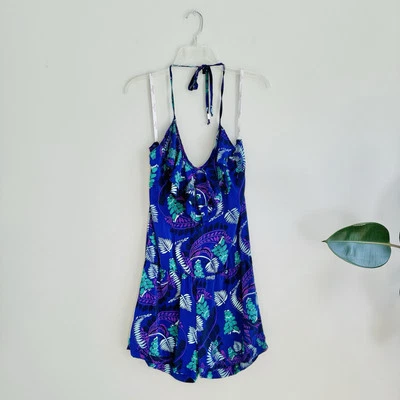 MACACÃO FEMININO KARINA GRIMALDI 100% SEDA ROXO FLORAL BABADO TAMANHO P - Imagem 1 de 4