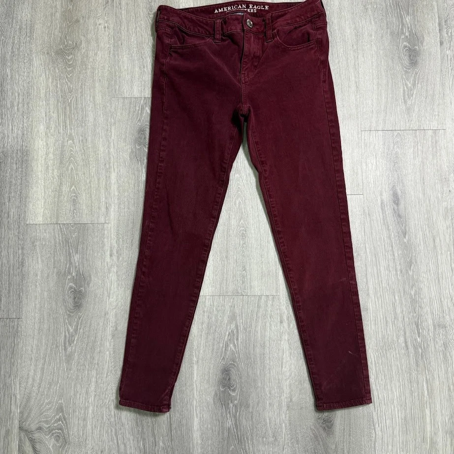 Pantalones ajustados American Eagle Jegging para mujer 4 cortos borgoña súper elásticos Foto 1 de 4