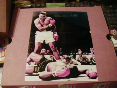 VINTAGE  SIGNED PHOTO  of  MUHAMMAD ALI  KNOCKING OUT SONNY LISTEN - Image 1 of 3