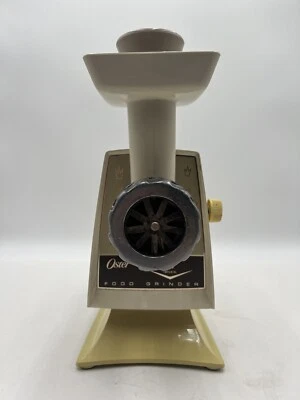 Molinillo eléctrico de carne y alimentos Oster Imperial de colección modelo 946-08E funcionando Foto 1 de 4