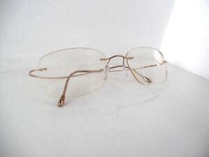 Unisex Silhouette Titan Gold Rimless Eye Glasses 7799 20 6061 160 Made  Austria