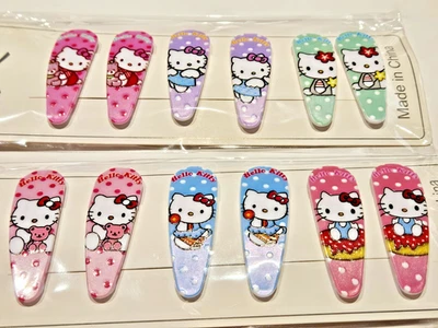 Juego de 12 pasadores de pelo Hello Kitty nuevos en paquete 2 cada uno de 6 diseños pinzas para el cabello Foto 1 de 4