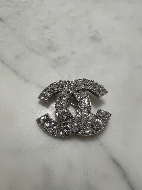silver chanel brooch