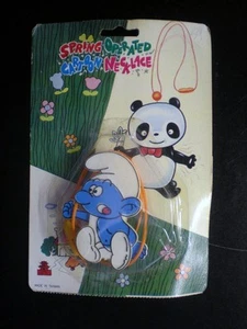 RARE Schtroumpfs Spring Operated cartoon necklage Peyo - Picture 1 of 1