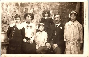 FASCINATING FAMILY PORTRAIT : PRICELESS EXPRESSIONS : TREGARTH, WALES : RPPC - Picture 1 of 4