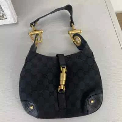 古驰黑色 GG 帆布小号 Jackie Nailhead 水饺包黑色和金色 — 第 1/4 张图片