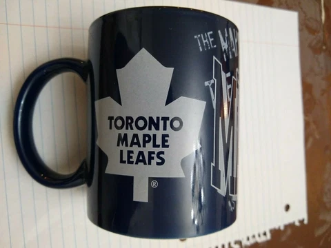 NHL TORONTO MAPLE LEAFS 11 OUNCE CERAMIC COFFEE MUG blue white Cover