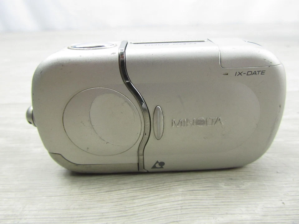 Cámara fotográfica Minolta Vectis 2000 APS Point & Shoot IX-DATE plateada sin probar Foto 1 de 4
