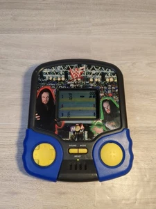 WWF WWE Undertaker Vintage 1998 LCD Video Handspiel MGA Entertainment funktioniert! - Bild 1 von 3