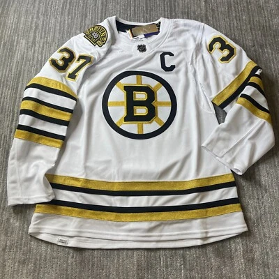 波士顿棕熊队 Patrice Bergeron 球衣男式 50 阿迪达斯 100 周年正品 — 第 1/4 张图片