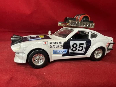 Bburago 1:24 Datsun 240Z Rally Car Model #85 With Roof Rack Barrels Vintage - image 1 of 4