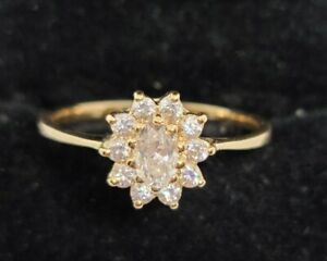 Halo Ring 14K Yellow Gold - CZ Oval Center & 10 CZ Round 2.9 Grams Ring Size 9.5