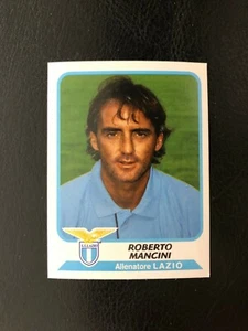 FIGURINA CALCIATORI PANINI 2003/04 LAZIO ALLENATORE MANCINI n 172 NUOVA VELINA - Bild 1 von 2