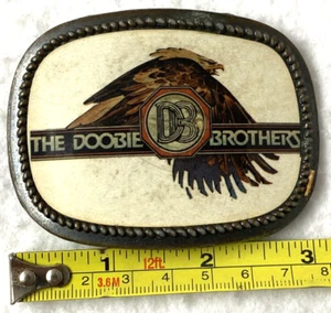 1977 DOOBIE BROTHERS BELT BUCKLE,CLASSIC ROCK&ROLL,BRASS?PROP,COLLECTIBLE,GIFT:) - Picture 1 of 3