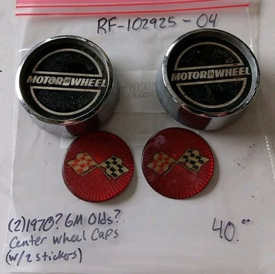 (2) Original 1970(?) GM Oldsmobile (?) Tapacubos centrales 'Motor Wheel' Foto 1 de 4