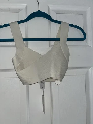 Top corto acanalado Babaton Aritzia 2XS NUEVO CON ETIQUETAS marfil Foto 1 de 4