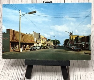 East Tawas MI - Michigan Downtown 1st Newman Street View, Shops Vintage Postcard - Picture 1 of 4
