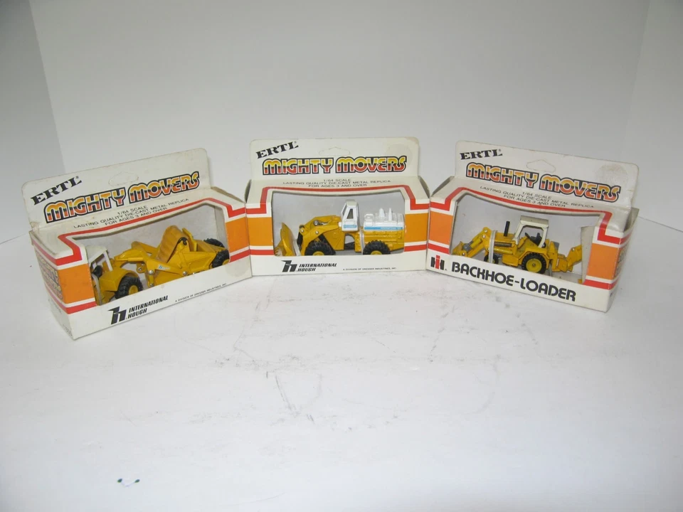 1/64 INTERNATIONAL EXCAVATOR, WHEEL LOADER & BACKHOE/LOADER NIB 1984 vintage - Image 1 of 1