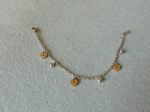 BRACCIALE DONNA IN ACCIAIO INOX CON CIONDOLI COLOR ARGENTO E ORO ROSA - Foto 1 di 7