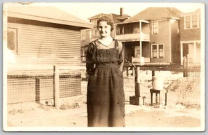 RPPC Young Woman Fenced Yard Residential Street Canada Big Houses Postcard - Picture 1 of 2