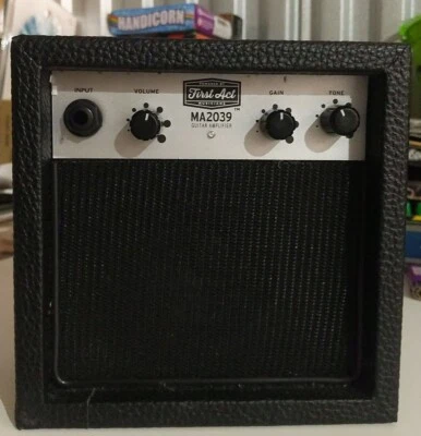 First Act Mini Portable Guitar Amplifier MA2039. Powered by x2, 9volt or AC - Image 1 of 2
