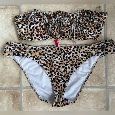 Bikini Victoria Secret marrón/blanco/negro animal print sin tirantes con flecos; L Foto 1 de 4
