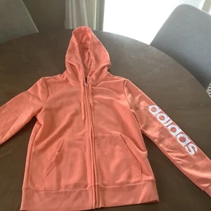 Neu mit Etikett Adidas Damen-Hoodie mit Reißverschluss Größe Medium orangefarben - Bild 1 von 2