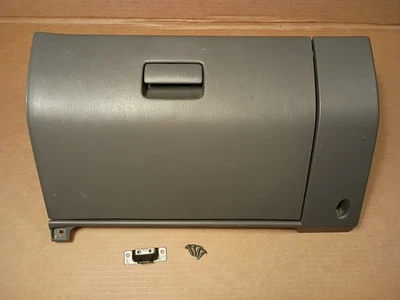 Nissan Frontier Xterra 2000-2003 guantera tablero inferior almacenamiento gris Foto 1 de 4