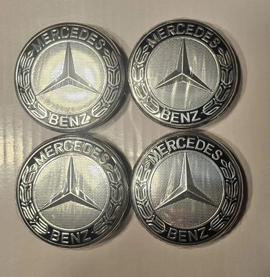 4 NEW Genuine OEM 98-25 Mercedes Benz Center Caps Set A1714000125 Laurel Wreath - Image 1 of 3